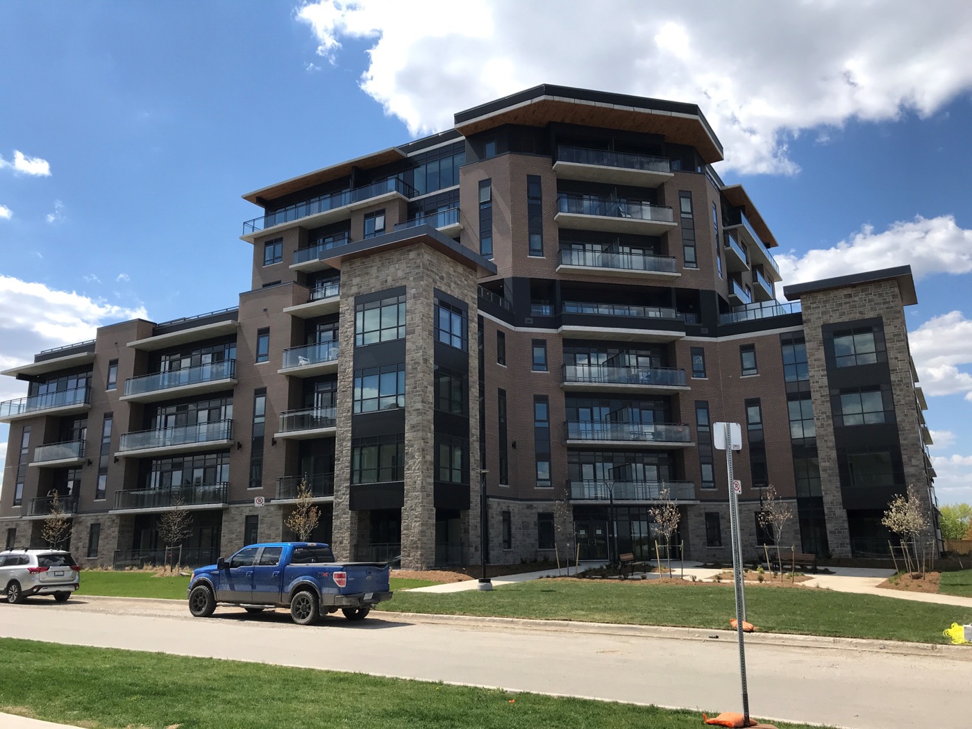 Apartment building with stone pattern precast at the base, cast on Solocast Seamless liners