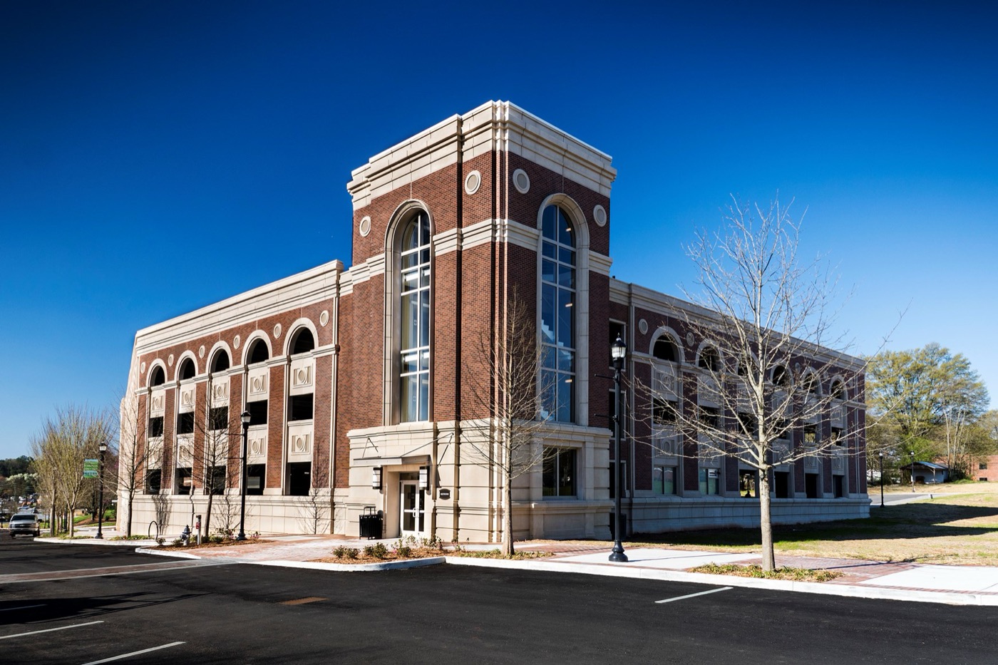 Brick-faced precast office building with cast stone details