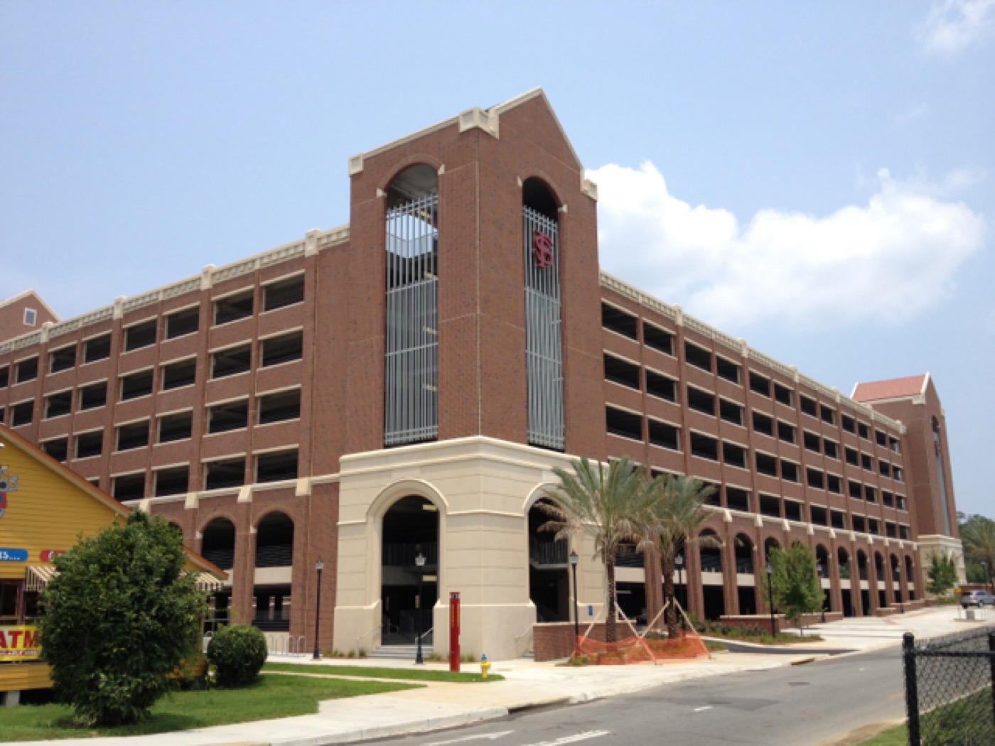 Parking structure with brick arches and a tower, cast as Solocast embedded thin brick panels