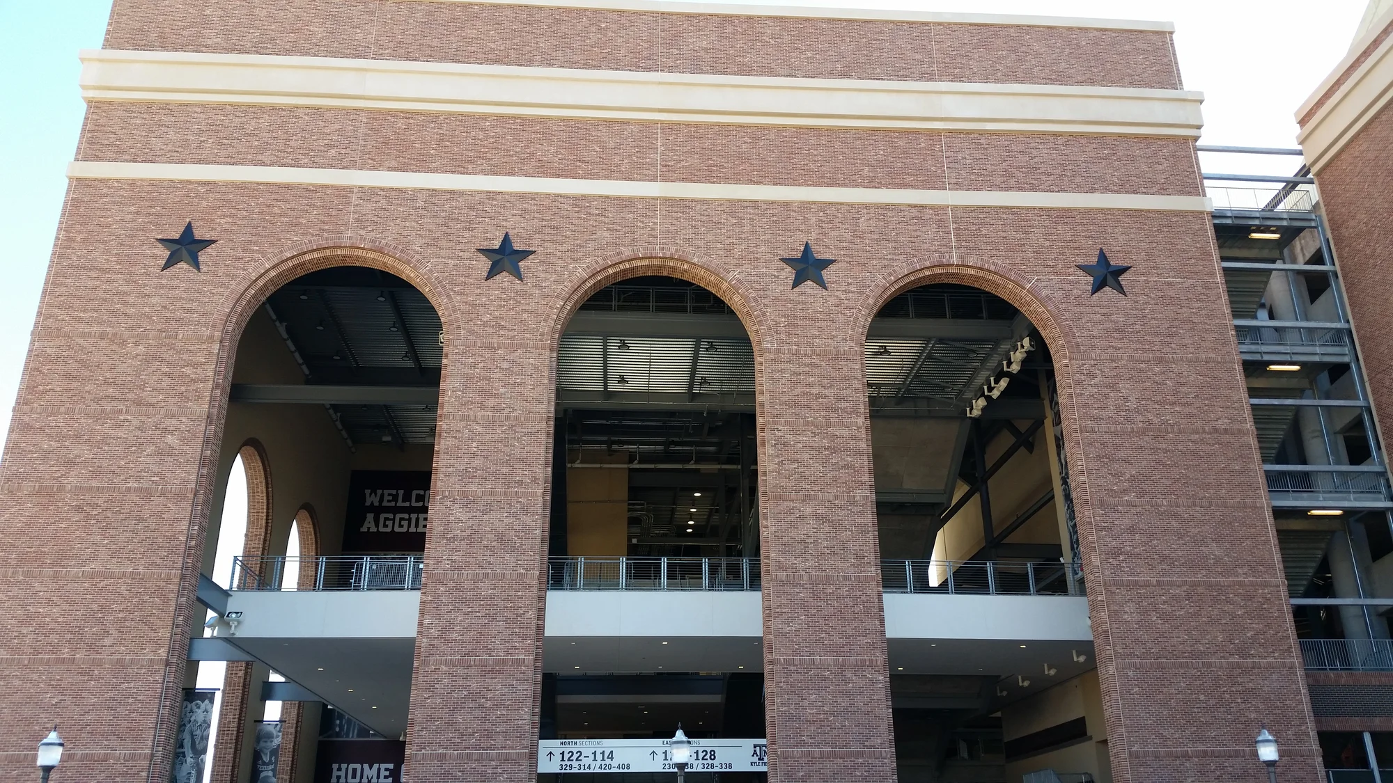 Stadium concourse with cast brick arches and returns