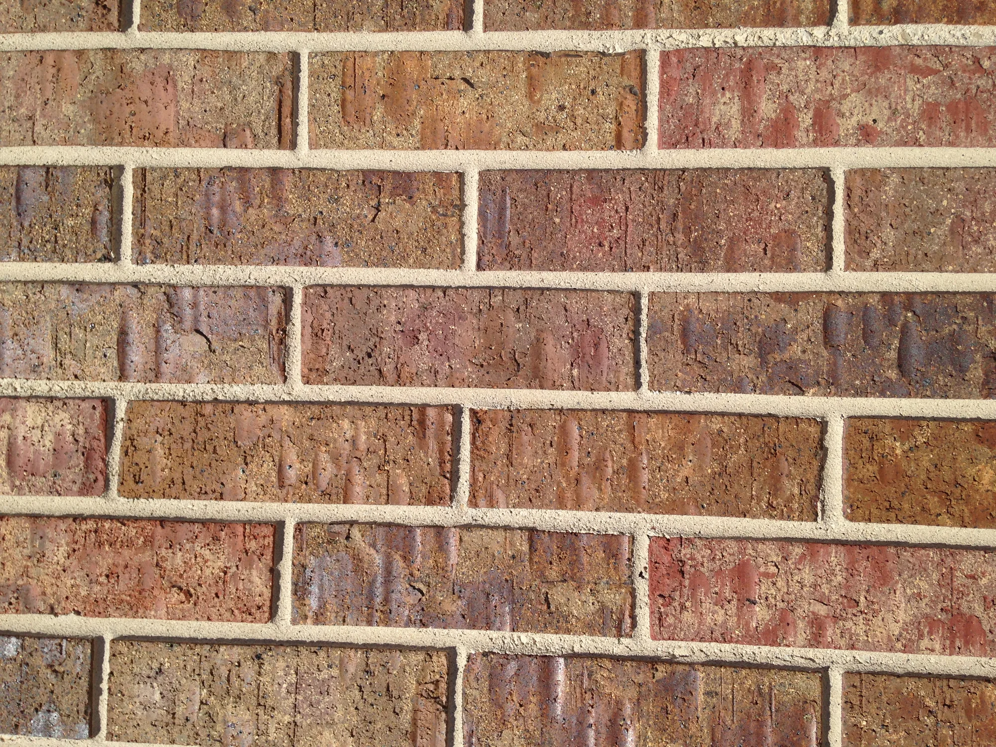 Precast panel faced with embedded thin brick