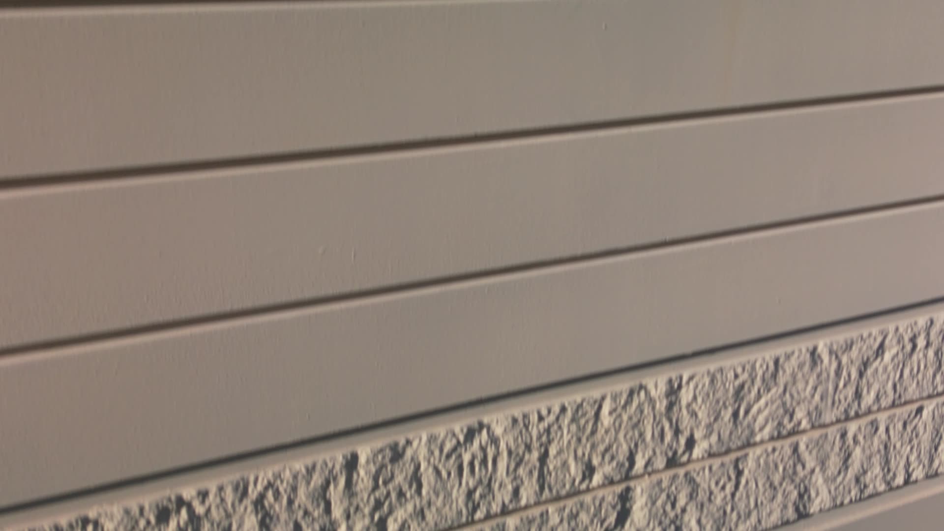 Split face and ribbed formliner panels on a precast building