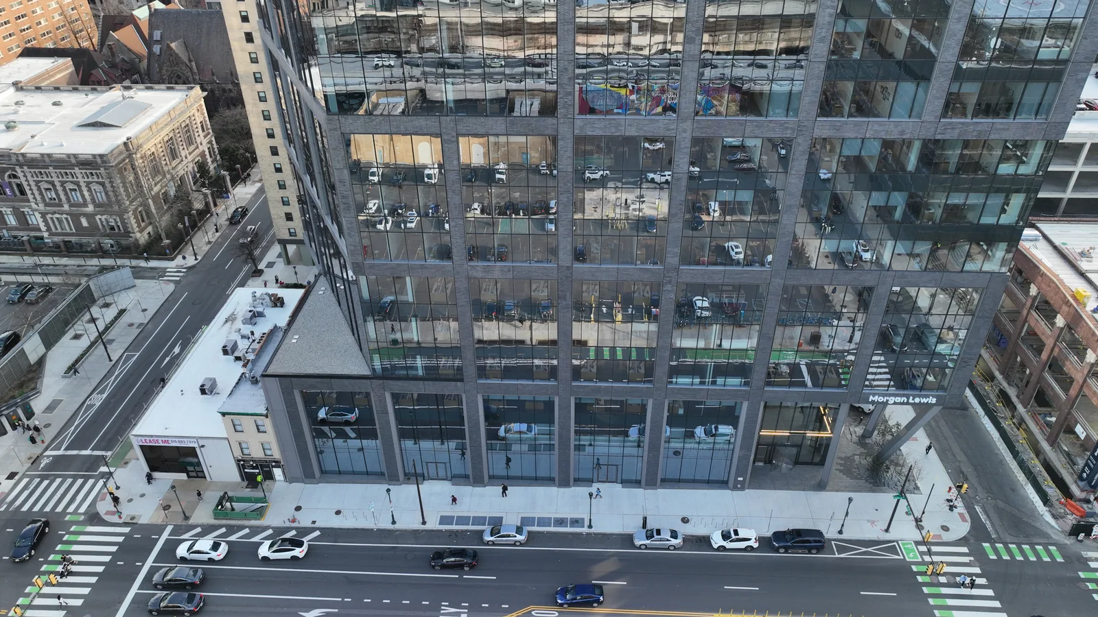 Looking down the brick-faced frame of 2222 Market Street