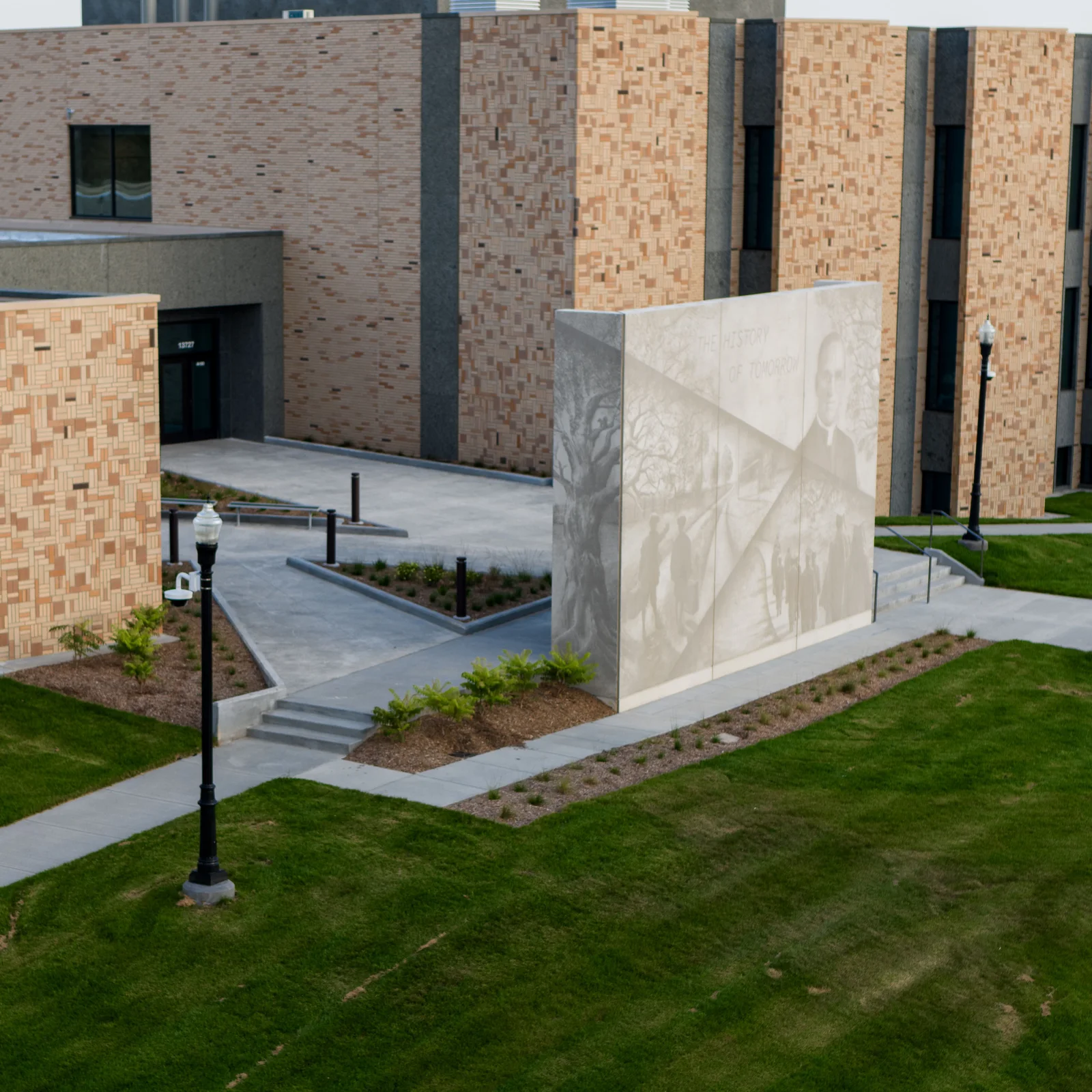 Boys Town Education Center, Boys Town, Nebraska, faced in Endicott Desert Ironspot Light, Ivory Blend