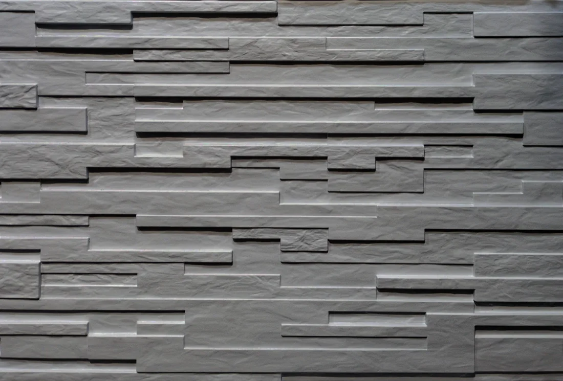 Random 1 and a half inch plank with varying depths textured formliner pattern cast in concrete