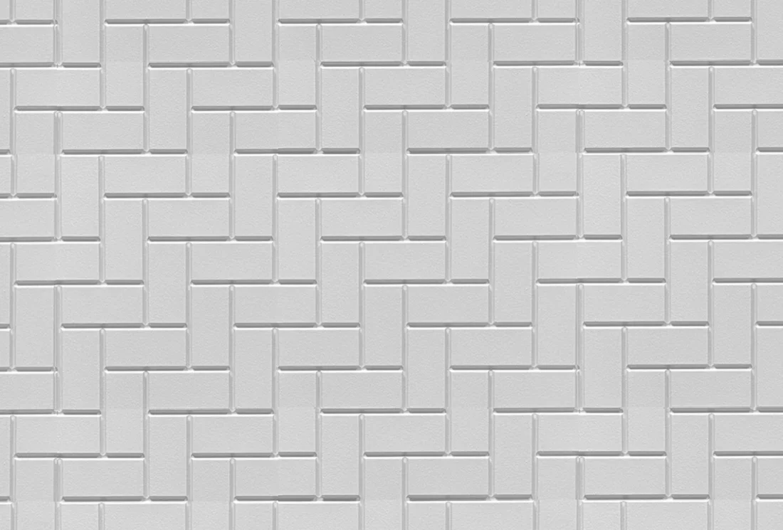 Modular herringbone formliner pattern cast in concrete