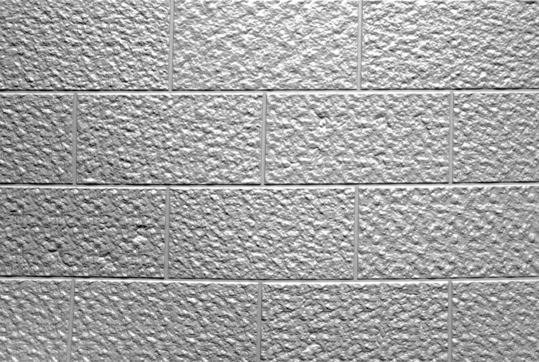 Half bond 112x24 split faced block formliner pattern cast in concrete