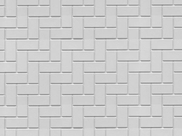Modular herringbone formliner pattern cast in concrete