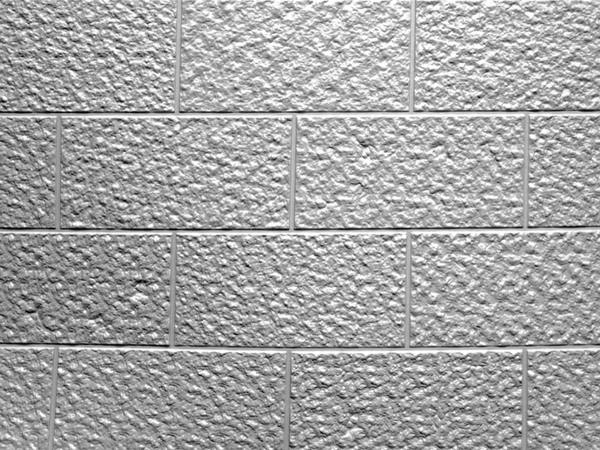 Half bond 112x24 split faced block formliner pattern cast in concrete