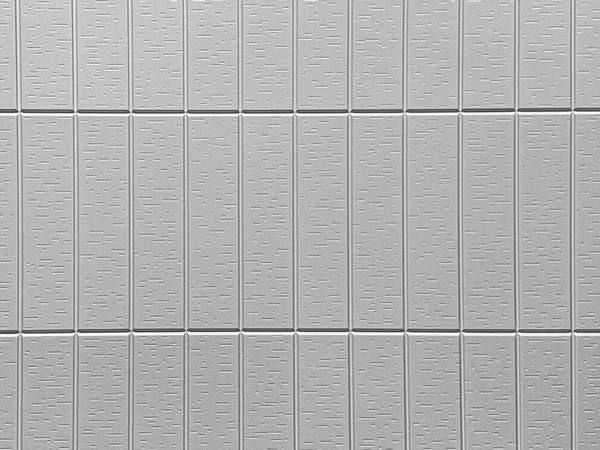 Stacked bond 4x16 block formliner pattern cast in concrete